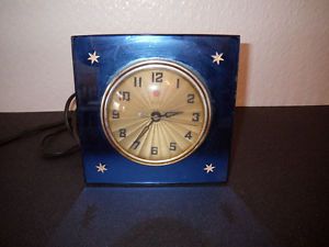 General Electric Art Deco Blue Mirror Glass Clock with Beautiful Star Accents