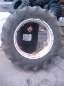 One Used 13 6x28 Firestone Tractor Tire w Used Rim Ford Massey Applications