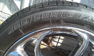 3 Yokohama 16" Tires and American Racing Chrome Wheels