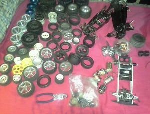 Lot Vintage R C Car Truck Tires Rims Motors Shocks Gears and Chassis