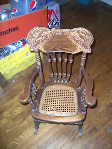 Childs Antique Rocking Chair Cane Wicker Pressed Back Bird Figures Spindle Arms