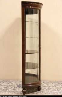 This curio display cabinet is solid quarter sawn oak. The deep brown